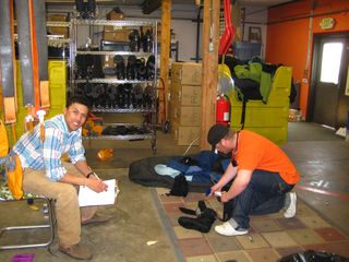 David Ketai helping Danny Lang de-issue winter gear