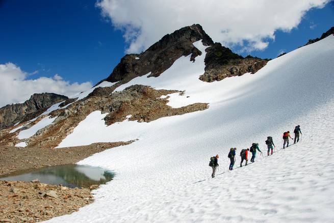 betsy-winston-ncw-7-9-08-16.jpg__655x5000_q70_subject_location-1936,1300_subsampling-2 Students mountaineering on a snowy slope in the remote and rugged North Cascade Range.