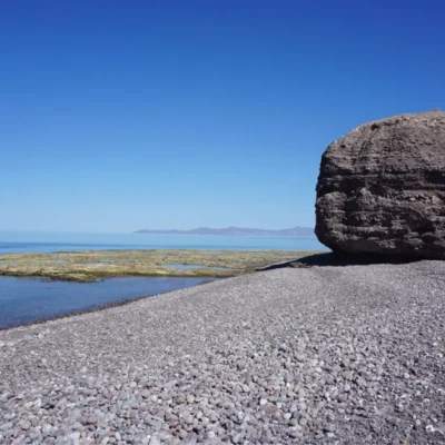 The expansive coastline of Baja with an island off in the distance.