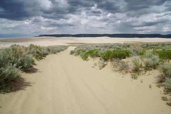 Clouds gathering behind Killpecker Sand Dunes in Sweetwater County, WY