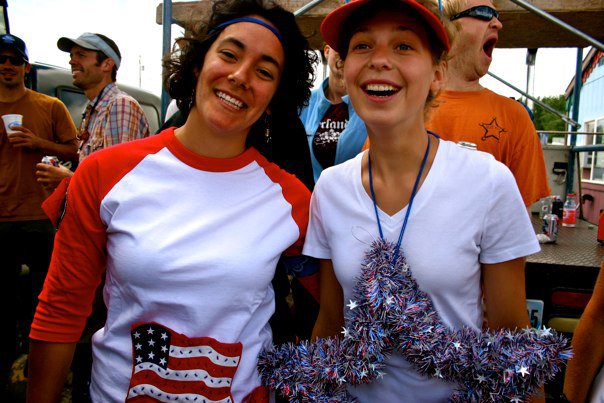 Adrienne and I display our patriotic spirit while admiring the floats in the parade.