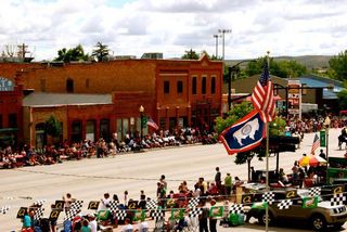 A big crowd waits anxiously for the annual Fourth of July Parade down Main Street to begin.