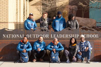 Brad_christensen__20130302_6999 Expedition Denali pose in front of NOLS World Headquarter sign