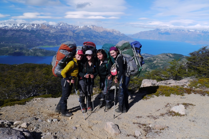 4 Gap Year Students posing with a mountain in the distance