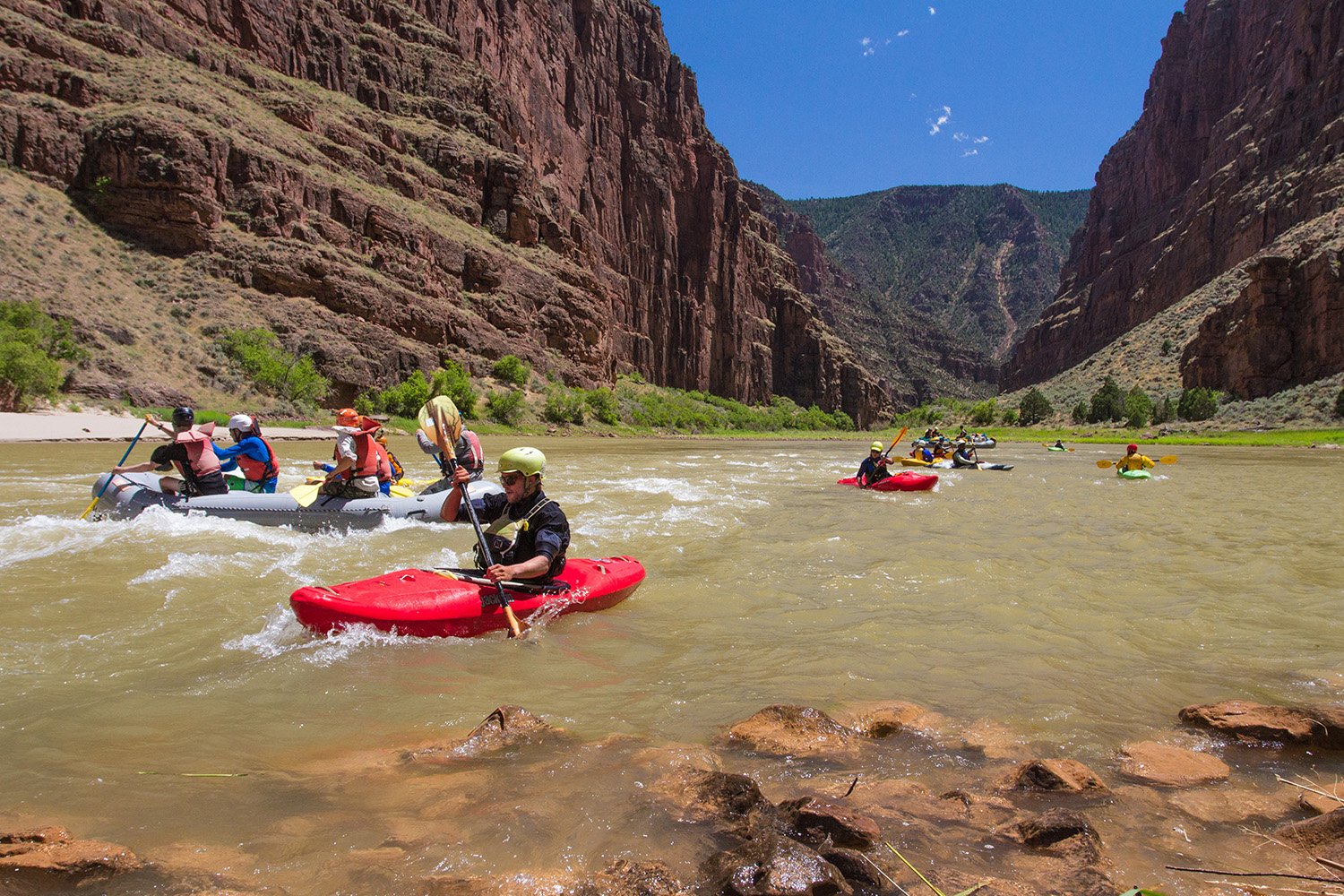 Group of NOLS students kayaking in Utah