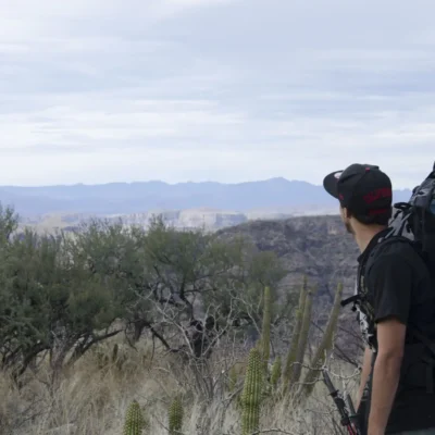 Student looking off into the distance while backpacking in Baja California, Mexico. Credit: Nick Hall