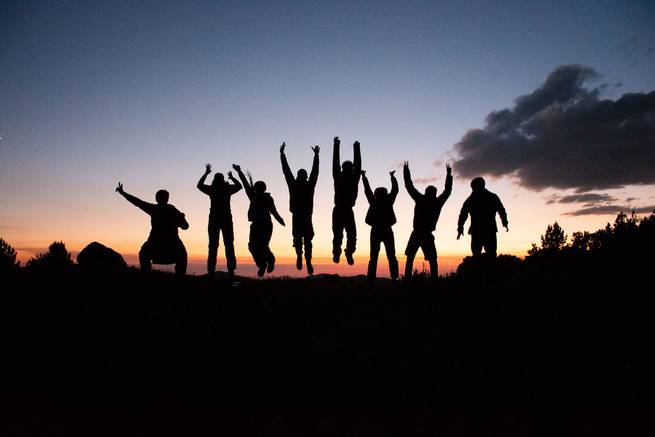 karolina_bassa.jpg__655x5000_q70_subject_location-2971,1886_subsampling-2 Students jump into the sunset after a long day hiking.