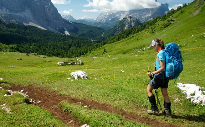 Woman hiking in Italy's Dolomites.